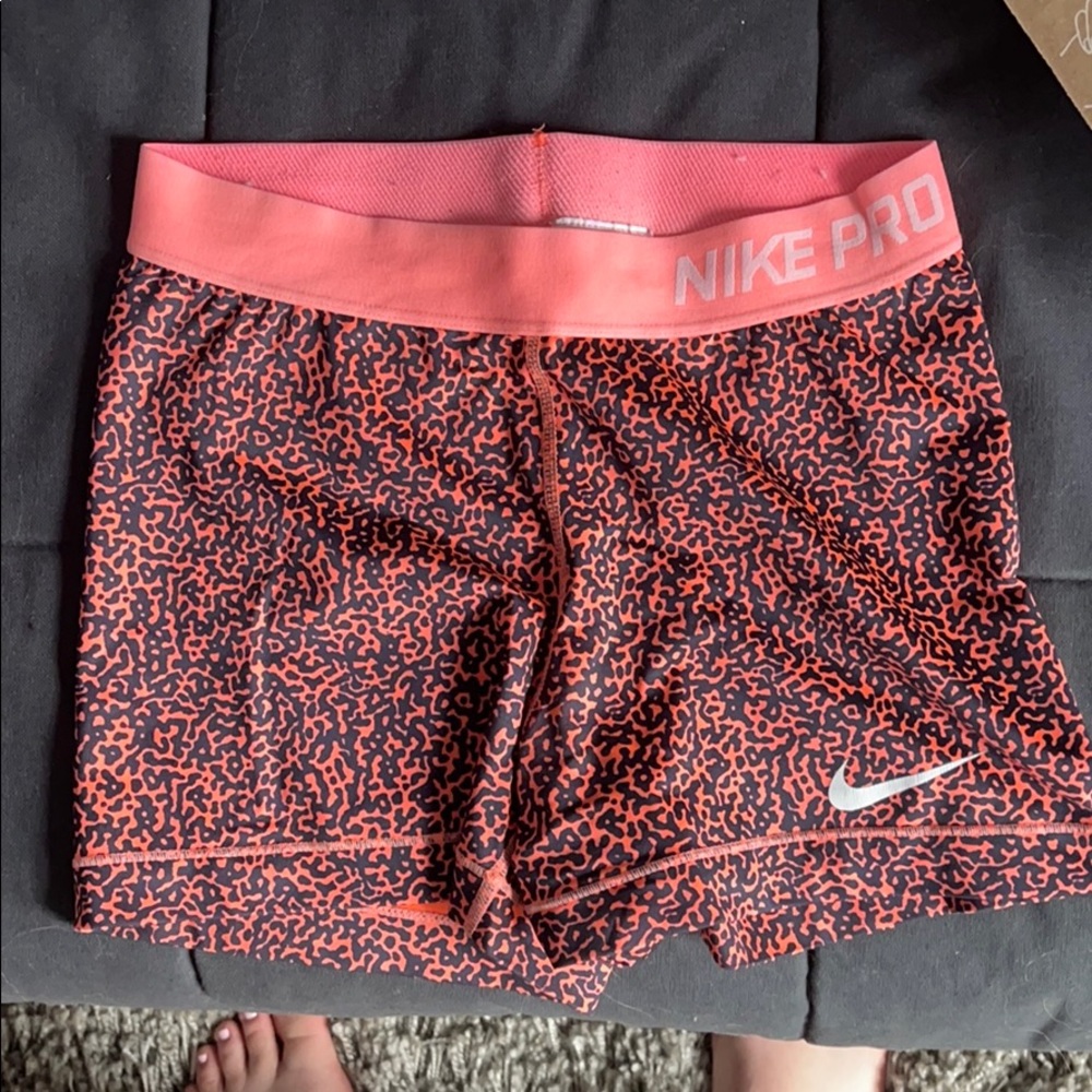 Nike Pros Orange and Black Pattern